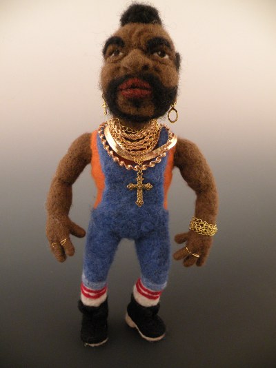 needle felted caricature doll Mr. T posing for his gallery portrait.