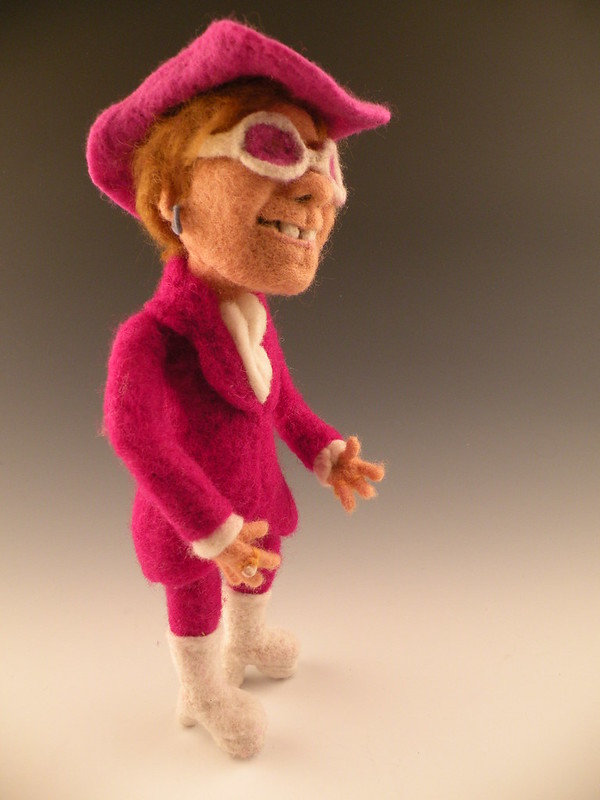 Li'l Elton John photoshoot in the lightbox. Looking good, sir.